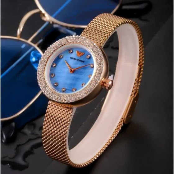 ساعت مچی زنانه صفحه آبی قاب فول نگین بند حصیری+باطری اضافی کد3007