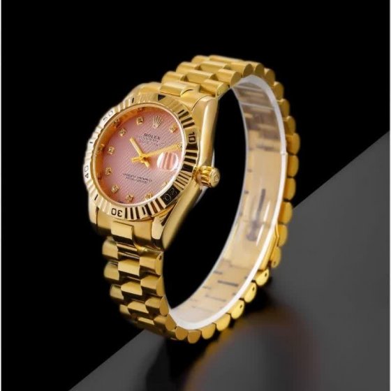 ساعت مچی زنانه رولکس  صفحه گرد و بند طلایی +باطری اضافی کد 4040