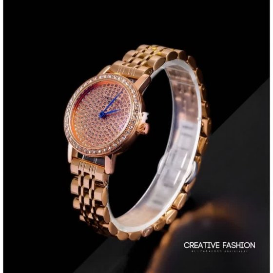 ساعت مچی زنانه صفحه گرد نگین دار و بند رزگلد +باطری اضافی کد 4043