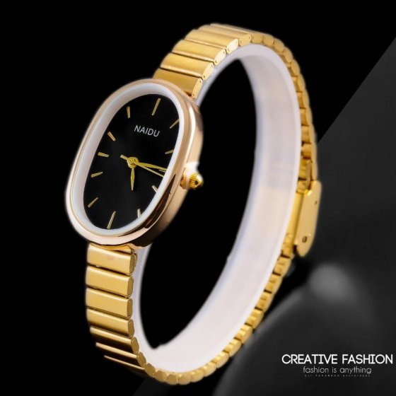 ساعت مچی زنانه بیضی بند استیل طلایی صفحه مشکی نایدو NAIDU+باطری اضافی کد 2519