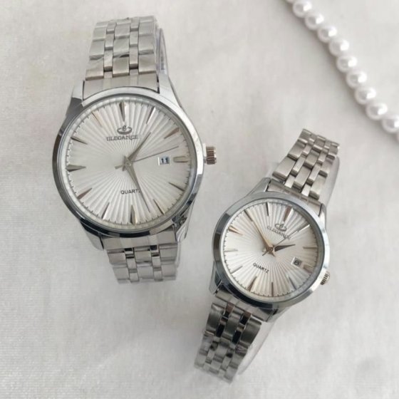 ساعت مچی مردانه الگانس صفحه سفید بند نقره ایی+باطری اضافی کد 2568