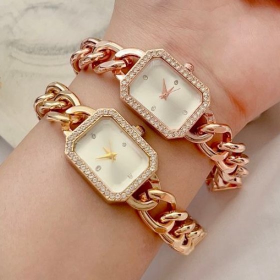 ساعت زنانه مجلسی سمبل برند کارتیه صفحه مستطیلی طلایی رزگلد+باطری اضافی کد 2678