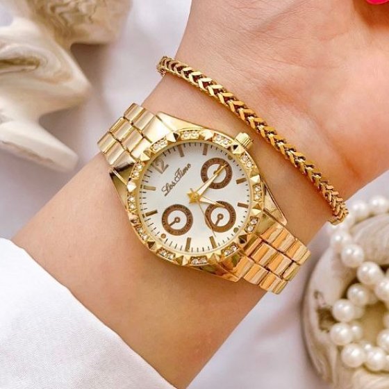 ساعت مچی زنانه طرح شین طلایی قاب طلایی طرح سه موتور بند استیل مجلسی شیک+باطری اضافی کد 2694