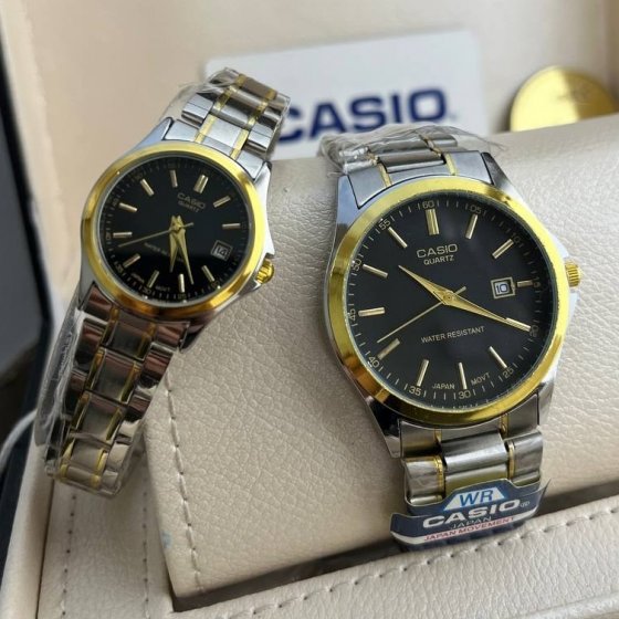 ساعت ست و تکی زنانه و مردانه عقربه ای کاسیو CASIO صفحه گرد مشکی  بند استیل دو رنگ طلایی نقره ایی+باطری اضافی  - تک کد 2726