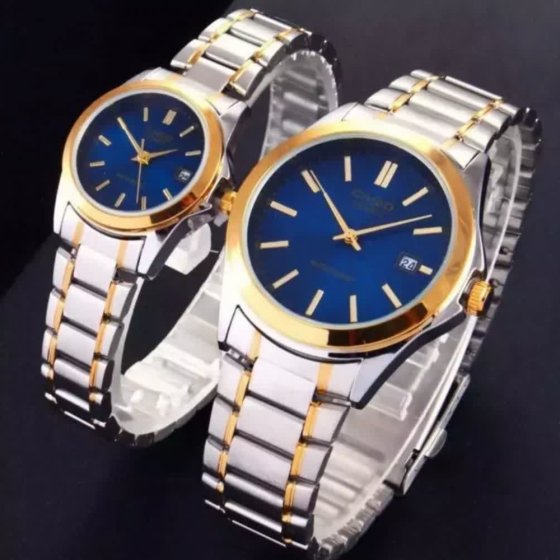 ساعت ست و تکی زنانه و مردانه عقربه ای کاسیو CASIO صفحه گرد آبی بند استیل دو رنگ طلایی نقره ایی+باطری اضافی - تک کد 2729