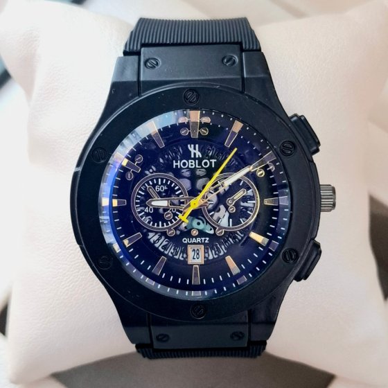 ساعت مچی مردانه (پسرانه) هابلوت Hublot تقویم دار عقره ایی بند سیلیکات مشکی موتور نمایان طرح دو موتوره عقربه طلایی+باطری اضافی کد2738