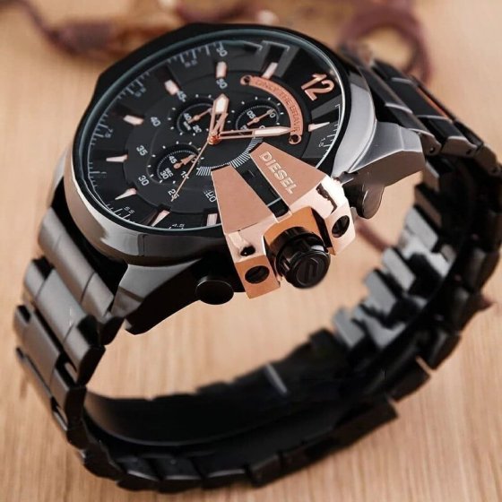 ساعت دیزل حک مردانه بنداستیل مشکی صفحه مشکی شاخ دار تقویم دار حک برند دیزل شاخ رزگلد+باطری اضافی کد 2756
