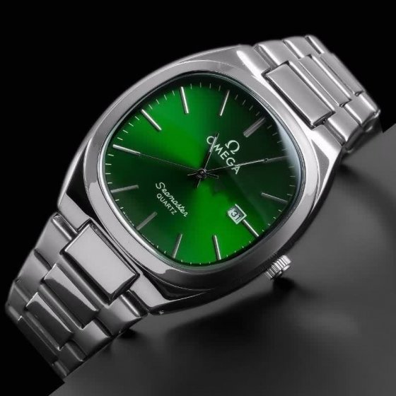 ساعت مچی مردانه برند امگا Omega شیشه کریستال ضدخش بند استیل نقره ایی درجه یک موتور ژاپن صفحه نمایش مربع سبز+باطری اضافی کد2867
