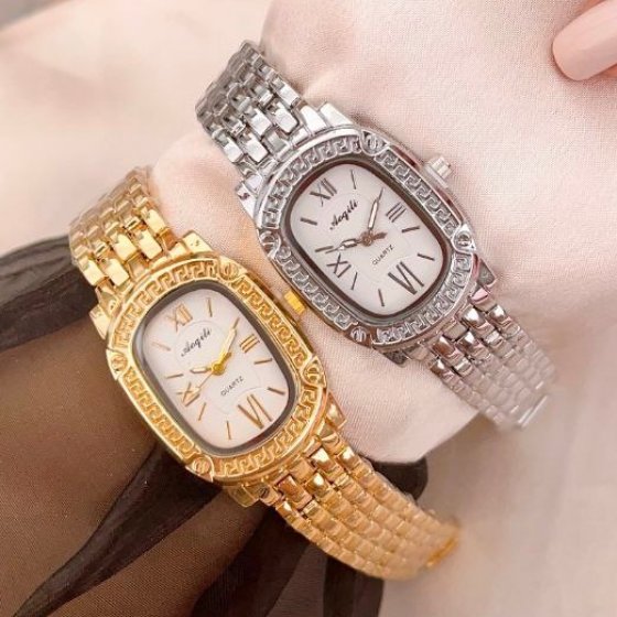 ساعت مچی زنانه مجلسی الی وی جواهری Ellie Vai‌ jewellery صفحه نمایس مستطیل نگین دار بند استیل طلایی+باطری اضافی کد 2972