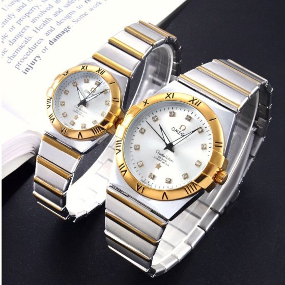 ست ساعت مچی زنانه و مردانه  امگا طرح کانستلیشن Omega Constelation کیفیت عالی بند استیل دو رنگ صفحه نمایش سفید+باطری اضافی کد3119