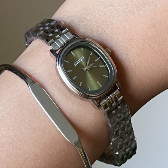 ساعت مچی زنانه نایدو NAIDU مدل صفحه بیضی سبز بند استیل+باطری اضافی  کد 3137