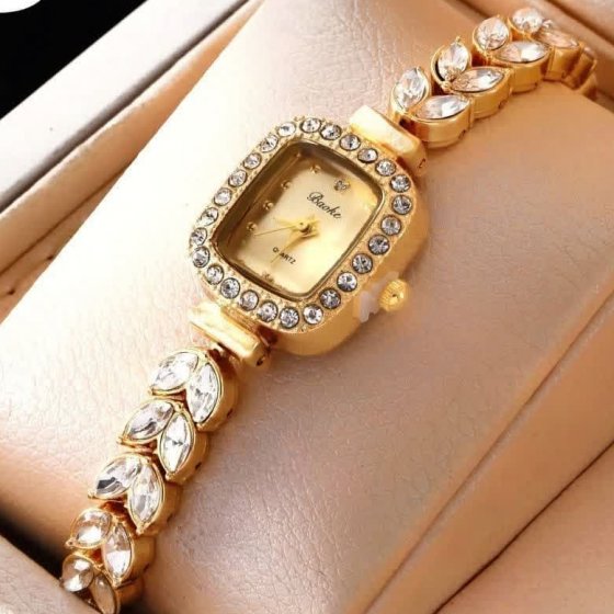 ساعت مچی زنانه بند نگین دار طلایی برند باعوک Baoke صفحه مربعی طلایی+باطری اضافی کد3145