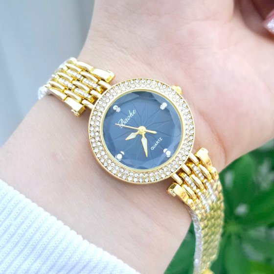 ساعت مچی زنانه BAOKباعوک نگین دار بند استیل نگین دارطلایی صفحه نمایش گردمشکی شیسه الماسی مجلسی-جدید +باطری اضافی کد3172