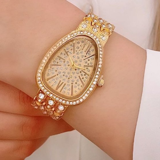 ساعت مچی زنانه دستبندی بولگاری Bvlgari  بند نگین دار طلایی+باطری اضافی کد 9071