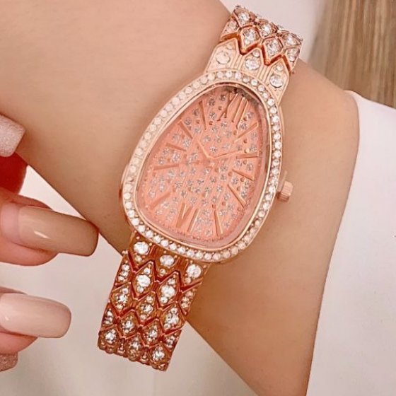 ساعت مچی زنانه دستبندی بولگاری Bvlgari بند نگین دار رزگلد+باطری اضافی کد 9072