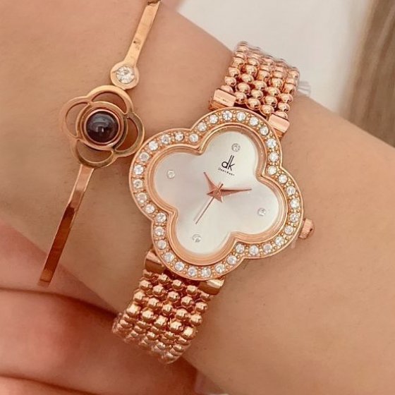 ساعت مچی زنانه و دخترانه طرح ونکلیف DEEN KEEN رنگ رزگلد صفحه نمایش سفید+باطری اضافی کد9074