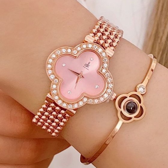 ساعت مچی زنانه و دخترانه طرح ونکلیف DEEN KEEN رنگ رزگلد صفحه نمایش صورتی +باطری اضافی کد9075