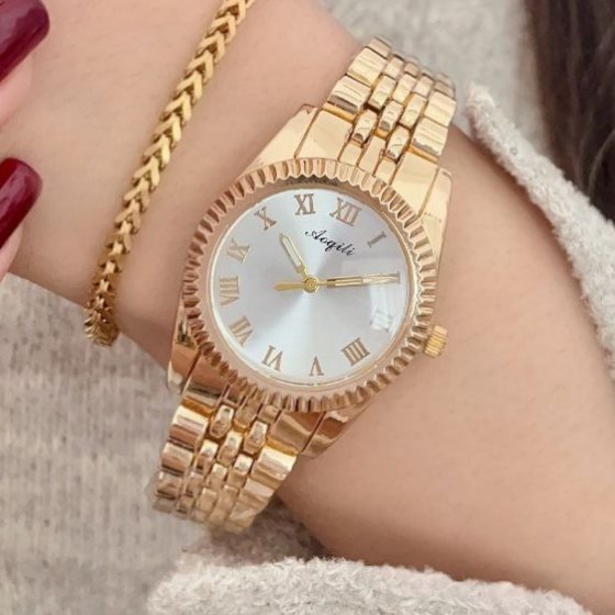 ساعت مچی زنانه طلایی الی وی جواهری Ellie Vai‌  صفحه نمایش گرد +باطری اضافی کد 9077