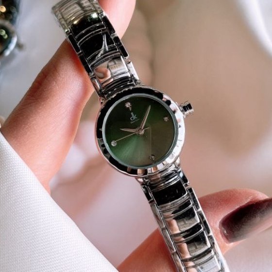 ساعت مچی زنانه شرکتی بند استیل نقره ایی صفحه نمایش گرد سبز ظریف و زیبا دین کین Deen Keen+باطری اضافی کد9100