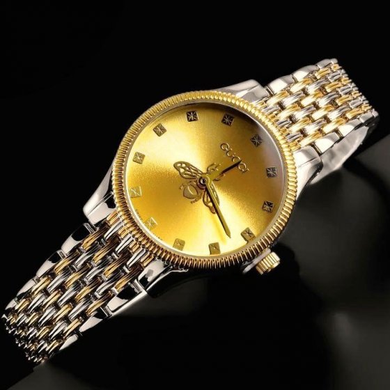 ساعت مچی زنانه گوچی Gucci بند استیل طلایی و نقره ایی  جدید و خاص+باطری اضافی کد9145