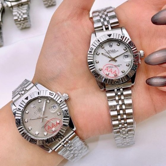 ساعت رولکس زنانه دیت جاست بند نقره ای صفحه گرد ضد آب  طوسی شیک+باطری اضافی کد 9177