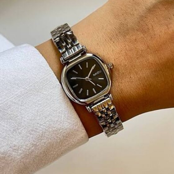 ساعت مچی زنانه نایدو NAIDU بند حصیری استیل نقره ایی مدل صفحه مربعی مشکی +باطری اضافی کد 9181