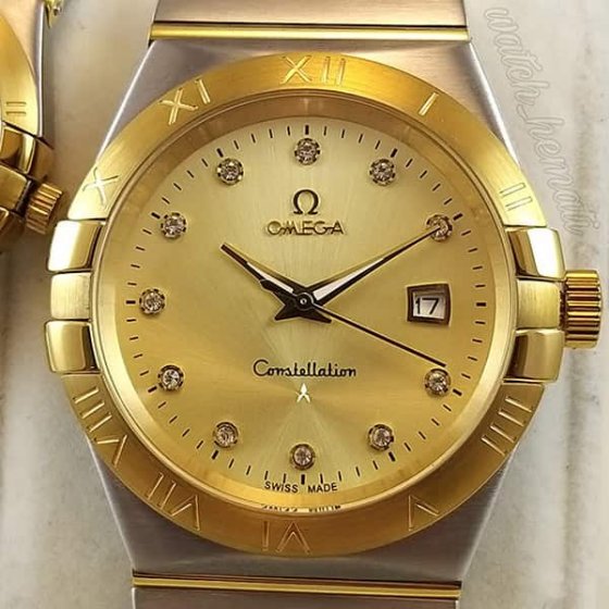 ست ساعت مچی زنانه و مردانه امگا طرح کانستلیشن Omega Constelation کیفیت عالی بند استیل دو رنگ صفحه نمایش طلایی+باطری اضافی کد 9195