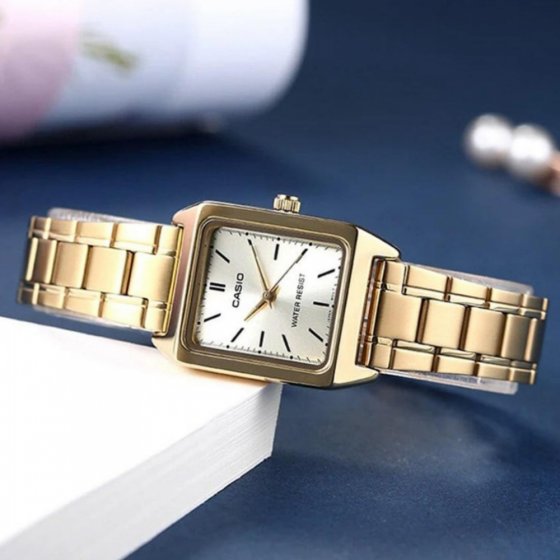 ساعت مچی زنانه کاسیو کلاسیک casio classic white بنداستیل طلایی صفحه نمایش سفید +باطری اضافی کد 9413