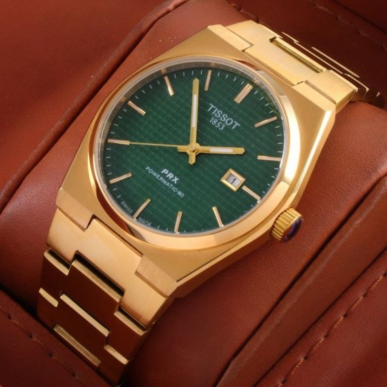 ساعت مچی مردانه تیسوتTissot بند استیل طلایی صفحه نمایش سبز شیک+باطری اضافی کد 9414
