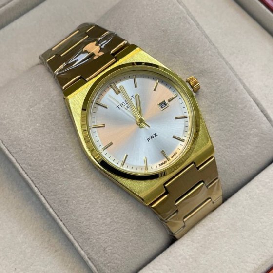 ساعت مچی مردانه تیسوت Tissot بند استیل طلایی صفحه نمایش سفید شیک+باطری اضافی کد 9415