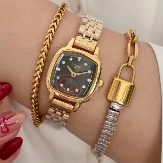 ساعت مچی زنانه تیسوت TISSOTبند استیل طلایی صفحه مربعی سبز+باطری اضافی کد 9424