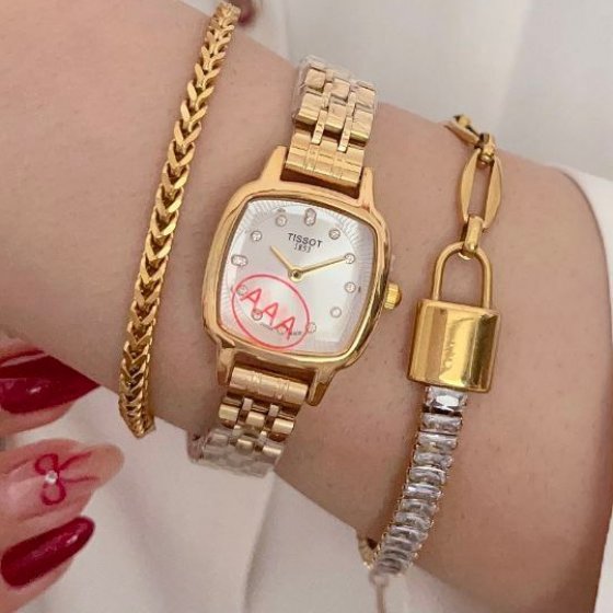 ساعت مچی زنانه تیسوت TISSOTبند استیل طلایی صفحه مربعی سفید+باطری اضافی کد 9426