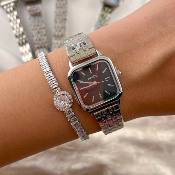 ساعت مچی زنانه نایدو NAIDU بند حصیری استیل نقره ایی مدل صفحه مربعی مشکی+باطری اضافی کد 9455