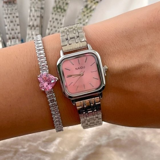 ساعت مچی زنانه نایدو NAIDU بند حصیری استیل نقره ایی مدل صفحه مربعی صورتی+باطری اضافی کد 9457