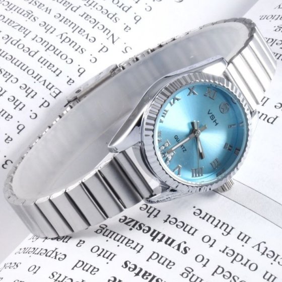 ساعت مچی زنانه Vsh بند استیل نقره ایی ریلی صفحه نمایش گرد ابی+باطری اضافی کد9514