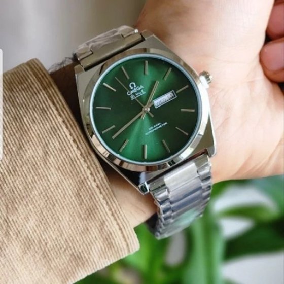 ساعت مچی مردانه امگا OMEGA طرح کلاسیک دو تقویم بند استیل نقره ایی صفحه نمایش سبز +باطری اضافی کد 9528