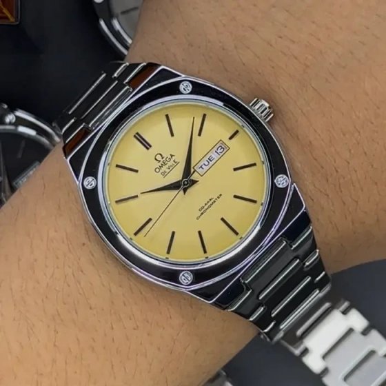 ساعت مچی مردانه امگا OMEGA طرح کلاسیک دو تقویم بند استیل نقره ایی صفحه نمایش طلایی+باطری اضافی کد 9530