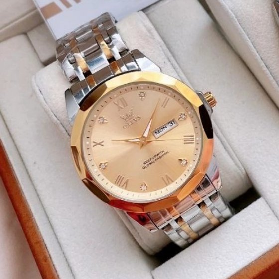 ساعت مچی مردانه اولوز OLEVS اورجینال (اصلی ) الماسی بند استیل دو رنگ صفحه نمایش طلایی+باطری اضافی کد 9541