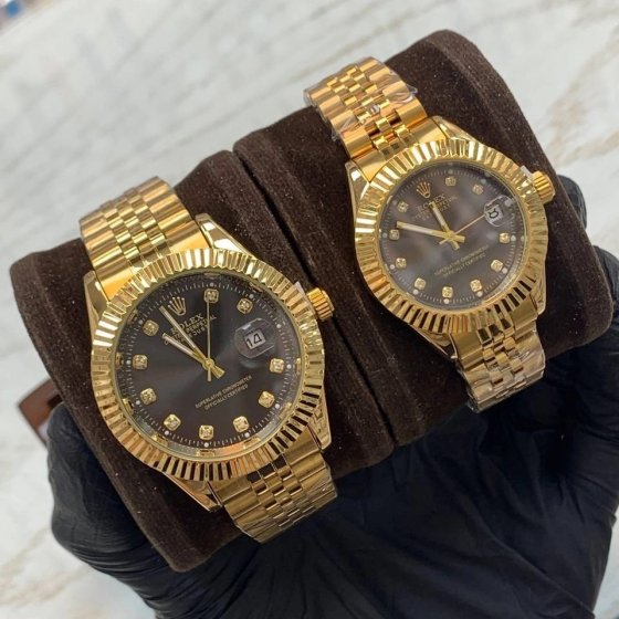ست ساعت مچی زنانه و مردانه رولکس ROLEX دیت جاست ، صحفه گرد مشکی بند استیل طلایی+باطری اضافی کد 9552