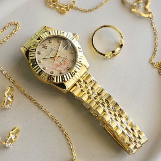 ساعت مچی زنانه مجلسی بند استیل رولکس ROLEX طلایی+باطری اضافی کد9577