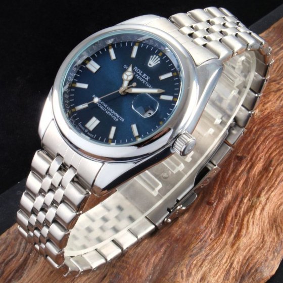 ساعت مچی مردانه رولکس دیت جاست Rolex بند استیل نقره ایی صفحه نمایش سورمه ایی شیک +باطری اضافی کد9589