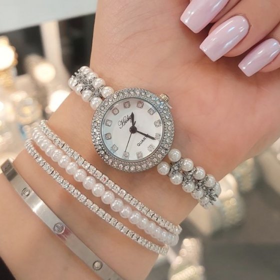 ساعت مچی زنانه مرواریدی هایدیHidy دور نگین نقره ایی مجلسی شیک و خاص+باطری اضافی کد9594