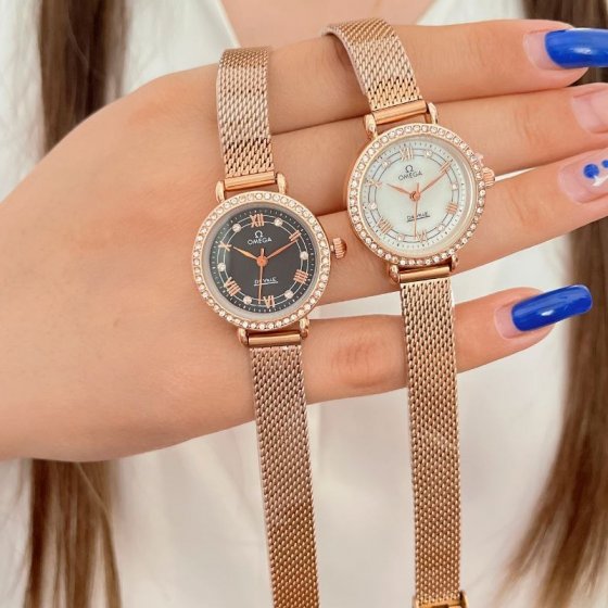 ساعت مچی زنانه امگا دویل OMEGA بند استیل حصیری رزگلد دور قاب نگینی لوکس و جذاب+باطری اضافی کد9597