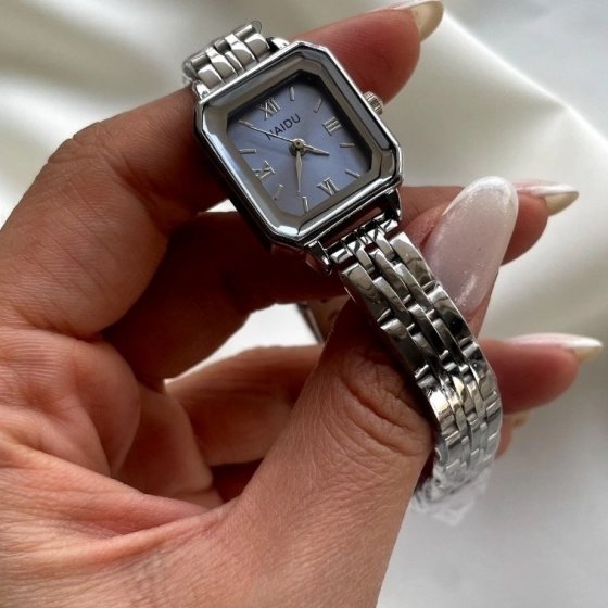 ساعت مچی زنانه و دخترانه نایدو NAIDU بند حصیری استیل نقره ایی مینیمال مستطیلی آبی+باطری اضافی کد9703