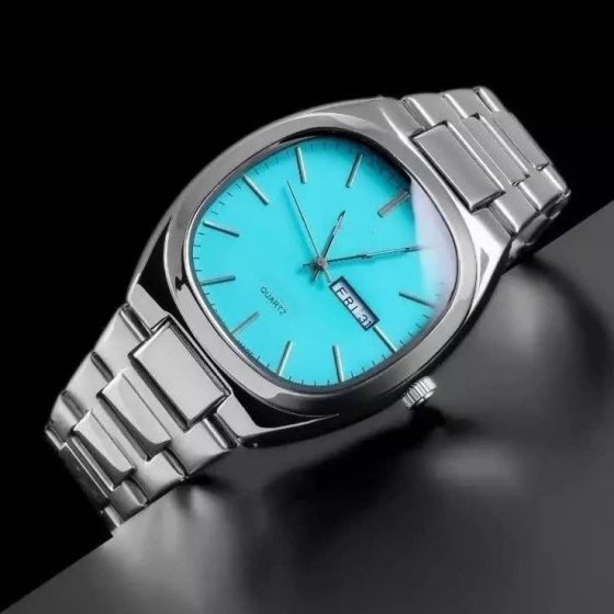 ساعت مچی مردانه کلاسیک کاسیو casio صفحه مربعی فیروزه ایی بند استیل نقره ایی+باطری اضافی کد 9739