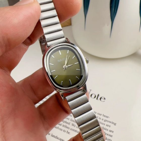 ساعت مچی زنانه نایدو NAIDU صفحه بیضی یونانی سبز بند ریلی(کرکره ایی ) استیل+باطری اضافی کد 9743