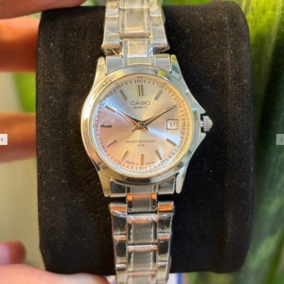 ساعت زنانه عقربه ای کاسیو CASIO صفحه گرد سفید بند استیل نقره ایی ضدآب+باطری اضافی کد 9751