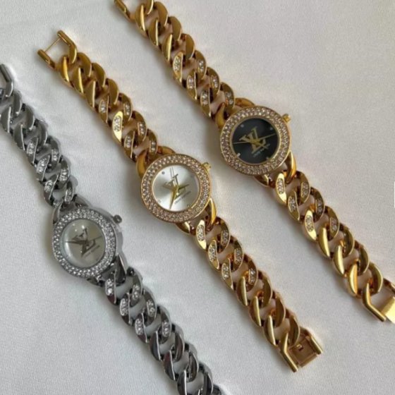 ساعت مچی زنانه برند لویی ویتون بند استیل طلایی کارتیر(زنجیری) نگین دارمجلسی +باطری اضافی کد9775