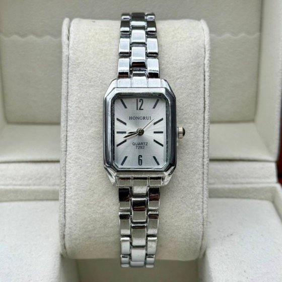 ساعت مچی دخترانه و زنانه هانگری نقره ایی صفحه مستطیلی  +باطری اضافی کد 10158