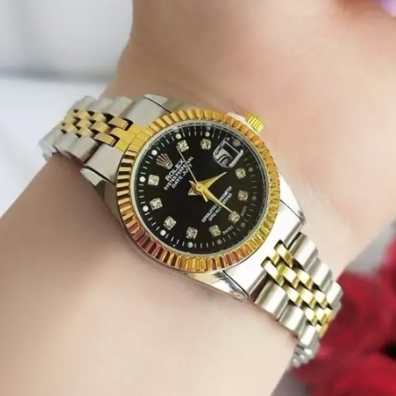 ساعت رولکس زنانه مردانه  دیت جاست بند نقره ای طلایی صفحه مشکی+باطری اضافی کد1532